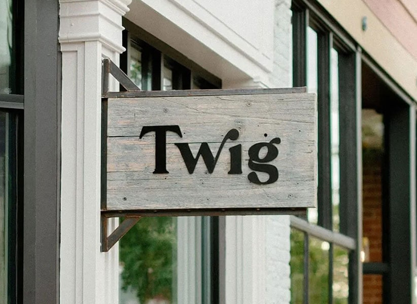 Twig Hair Salon Boulder, Colorado wood sign outside shop